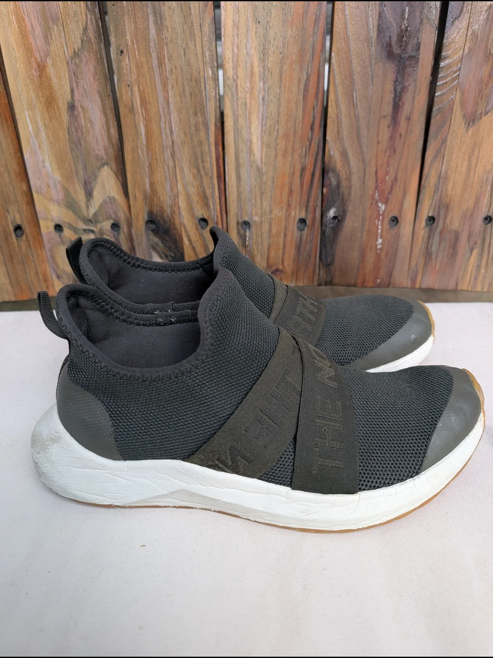 The North Face Women’s Slip-On Athletic Sneakers in Olive Green and White